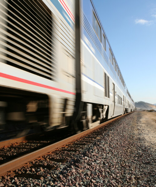 Ground level close up along high speed train