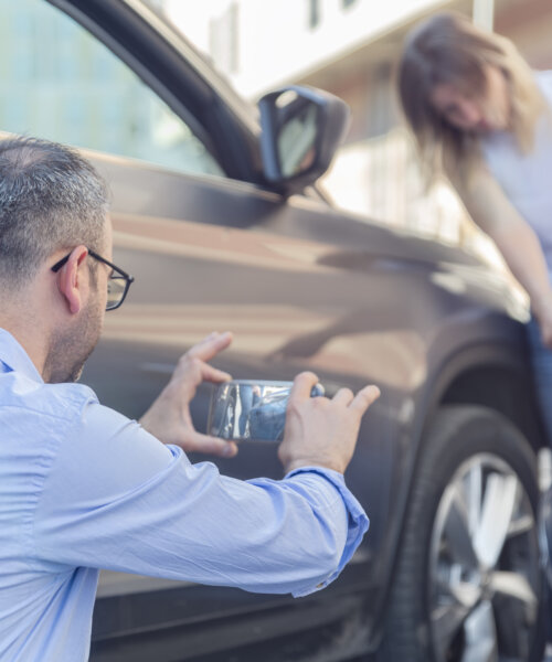 Photographing Car After A Traffic Accident