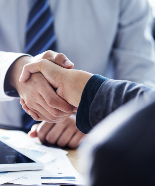 Business handshake in the office