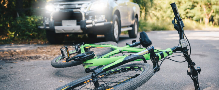 Conceptual of accident car crash with bicycle on road