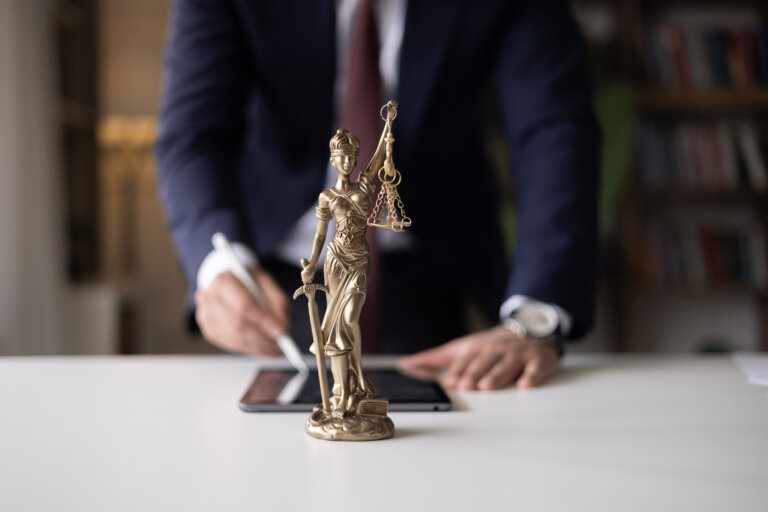 lawyer examining and signing legal documents.
