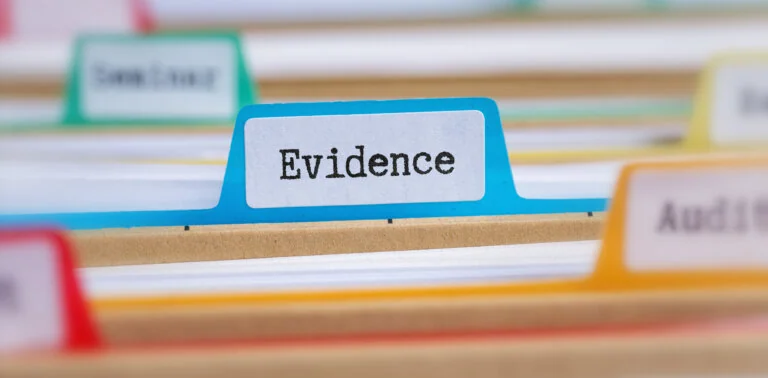 File folders with a tab labeled Evidence